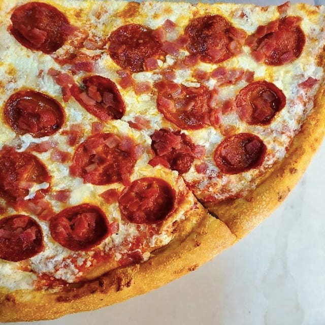 Artistic Pizza's Bacon Pepperoni Pizza.