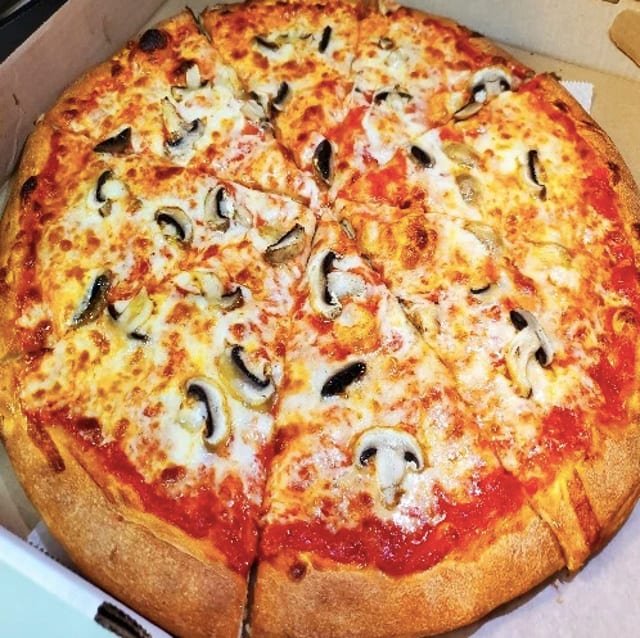 Artistic Pizza's Mushroom Pizza.